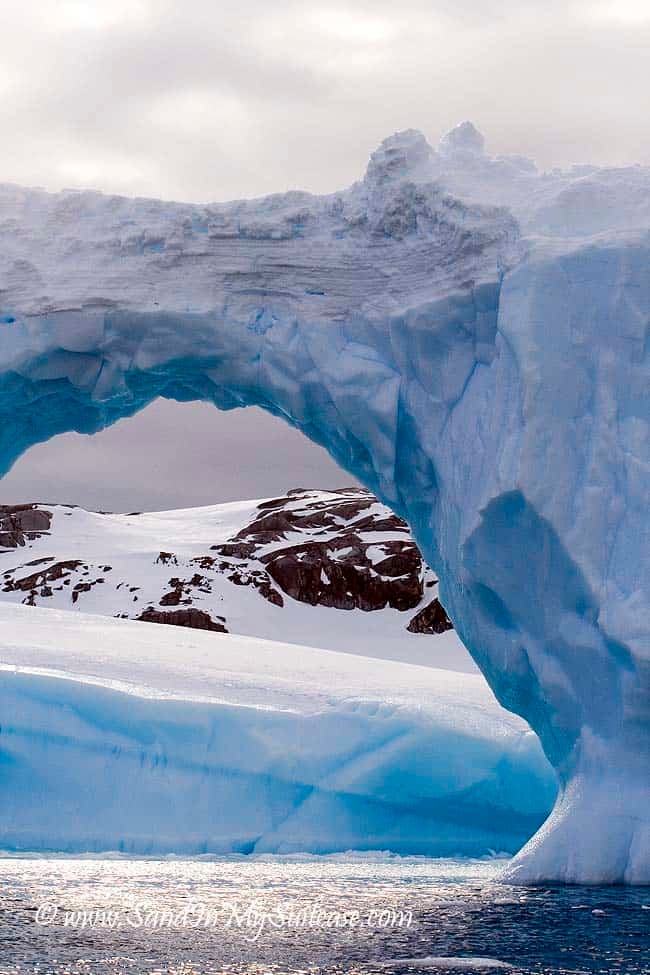 A huge arch-shaped iceberg
