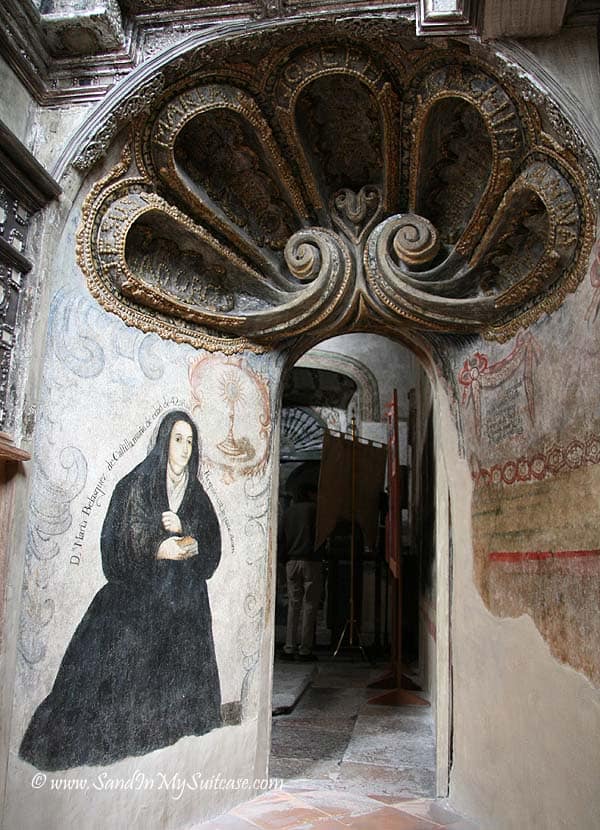 An arched doorway into a small chapel