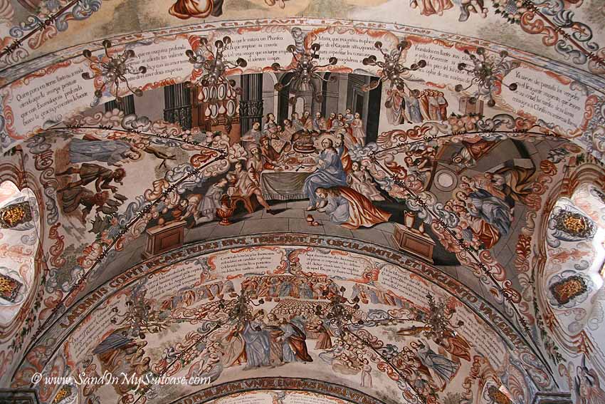 A ceiling cupola completely covered in frescoes