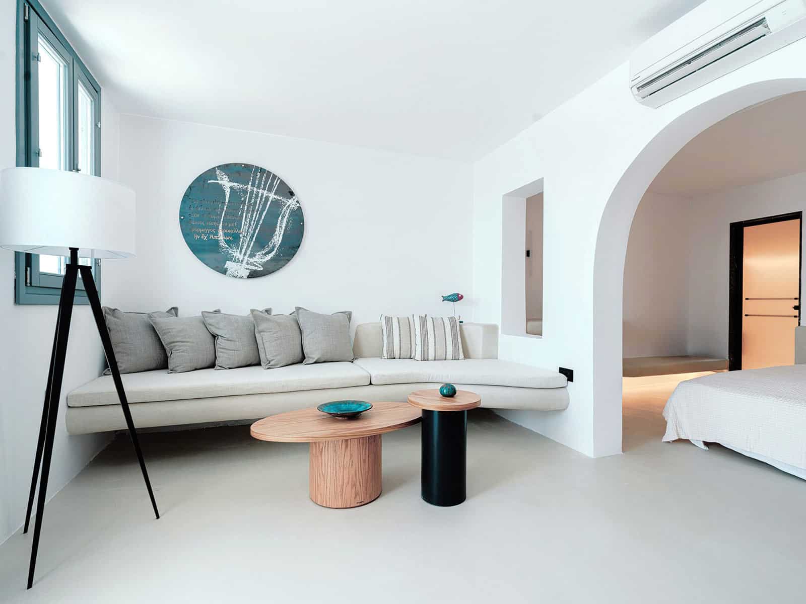 White-washed living room of Musician's Suite at IKIES