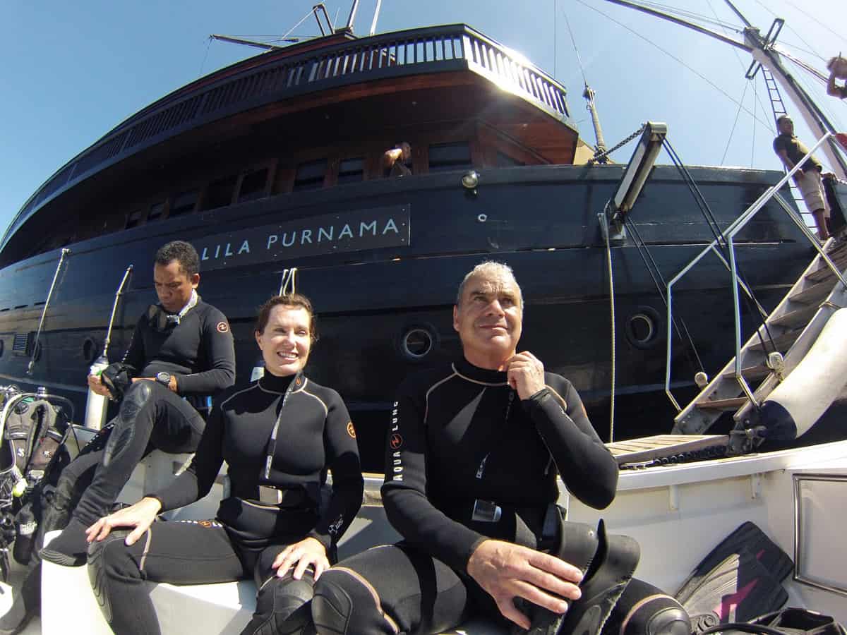 Us, in wetsuits, getting ready to dive