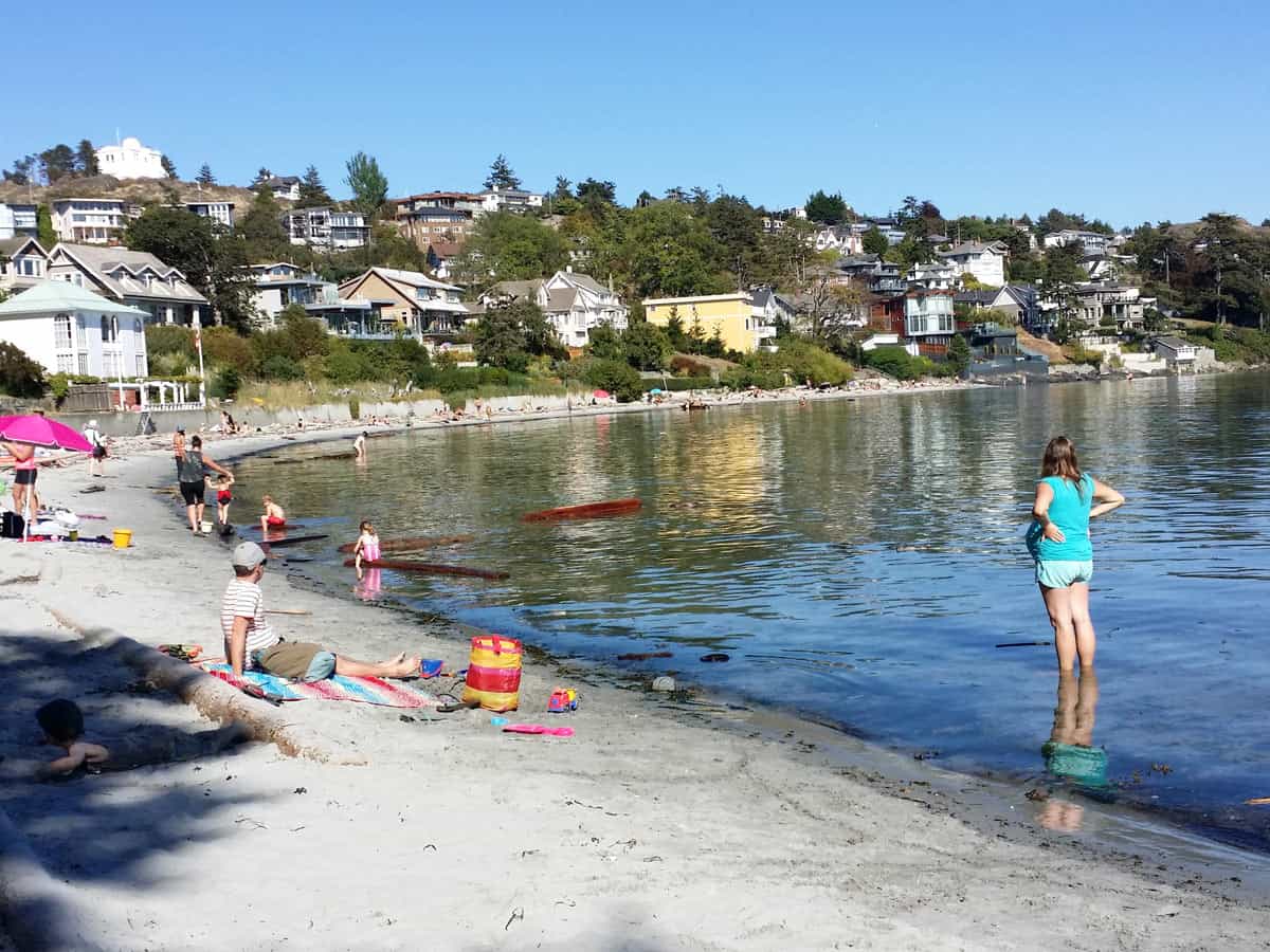 Kids playing in the water at Gonzales Beach, Victoria