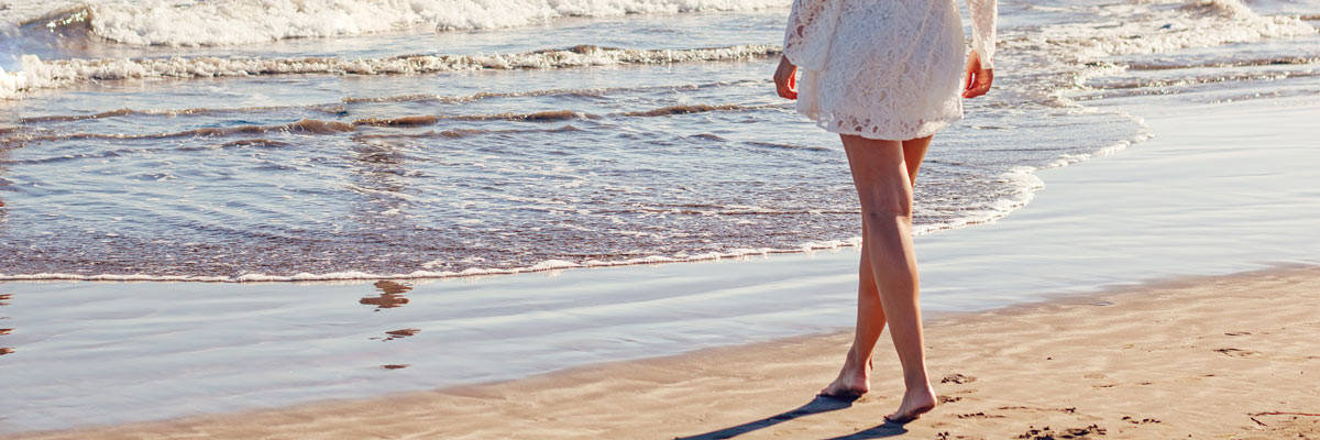 Woman-on-beach holiday in los cabos