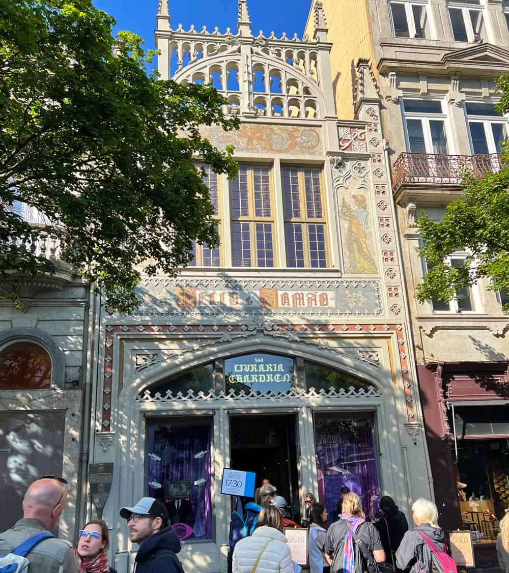Visitors line up outside Livraria Lello, in Porto