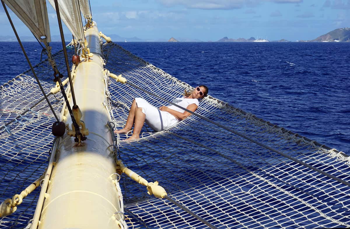 A woman reclines in the widow's net on the Star Flyer cruise ship.