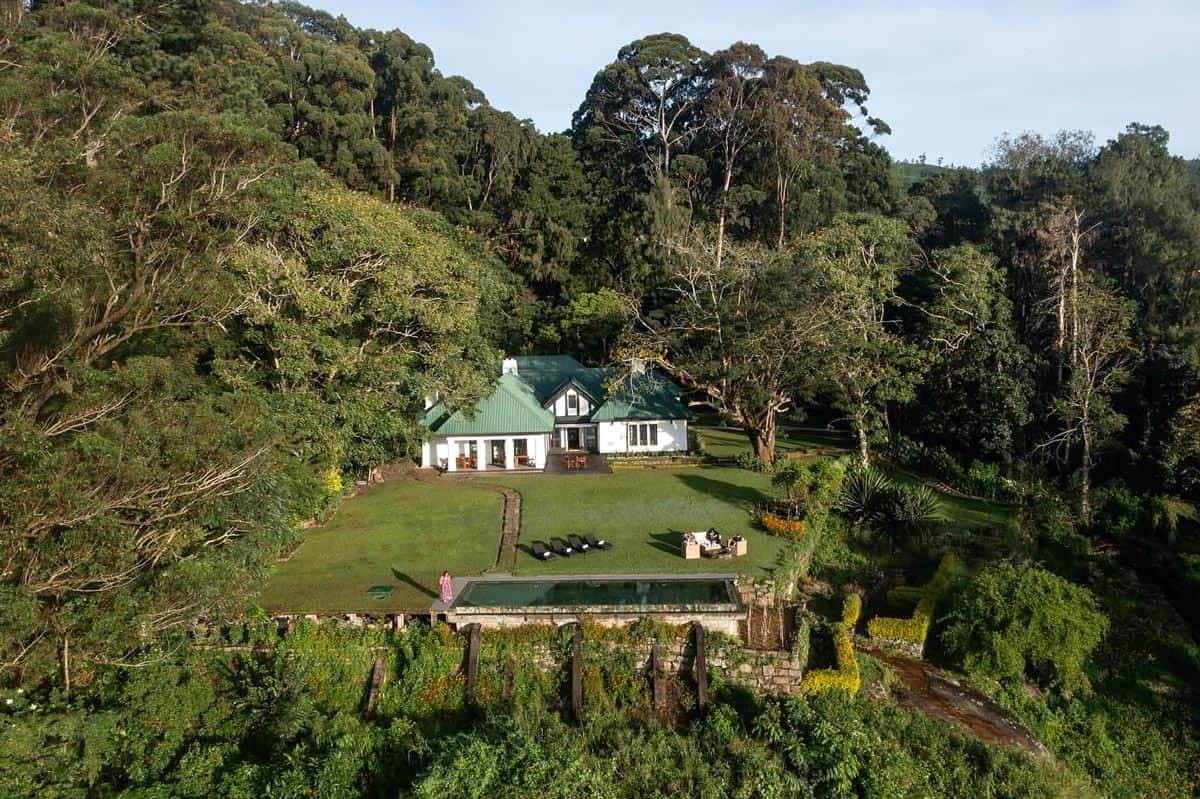 Tea country bungalow in Sri Lanka with a green-tiled roof