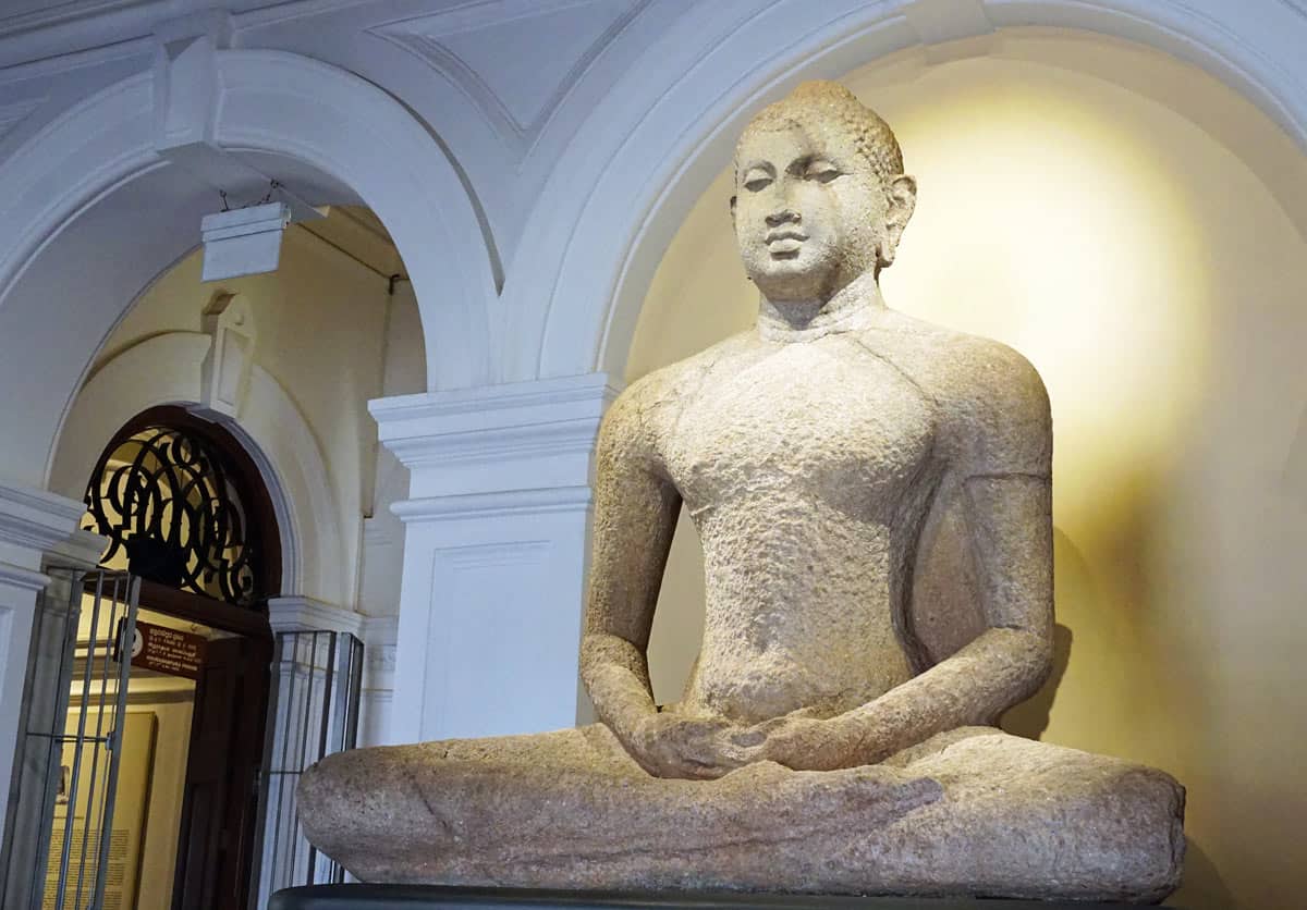 Giant seated Buddha sculpture at entrance to the Colombo Museum