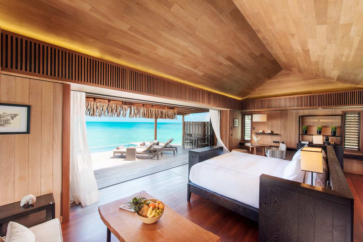 Bedroom of Conrad Nui King Deluxe Overwater Bungalow