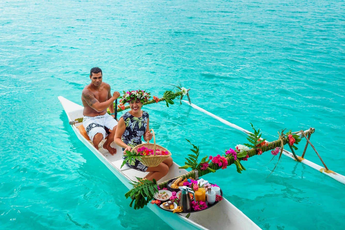 Breakfast delivered by outrigger canoe at St. Regis Bora Bora