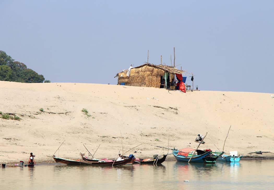 A shack on the riverbank that will be washed away in rainy season