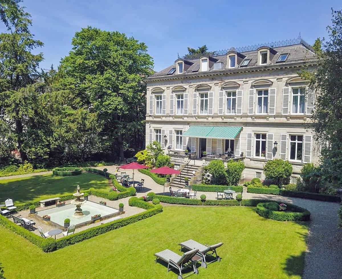 Lawns in front of grand mansion turned hotel