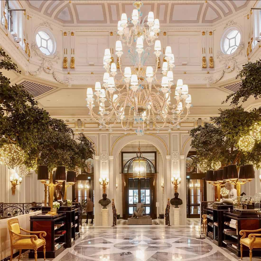 The St. Regis Rome lobby with giant chandelier and marble floors