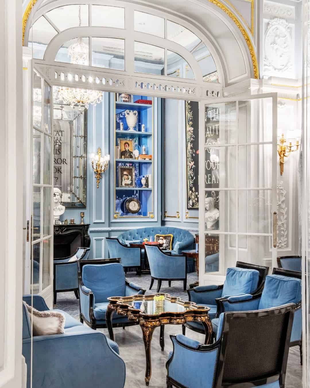 Blue armchairs in The St. Regis Rome lobby