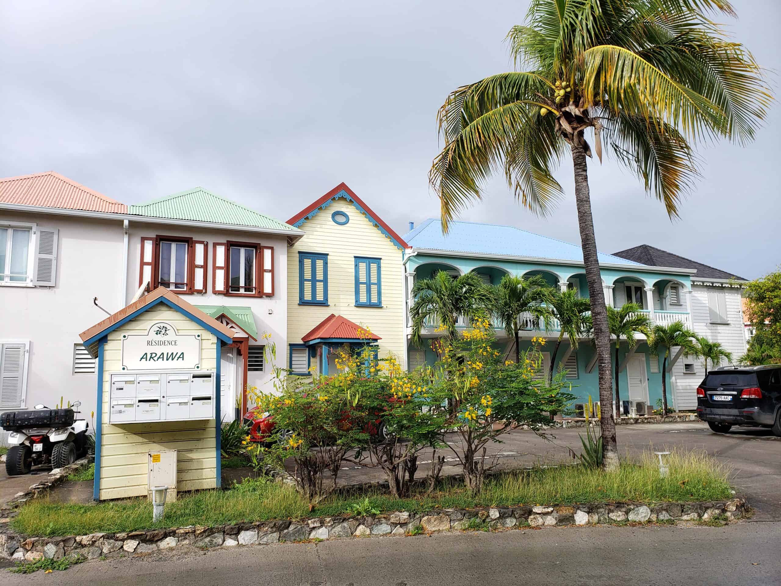 Colorfully painted homes and apartments in Orient Bay Village, St. Martin
