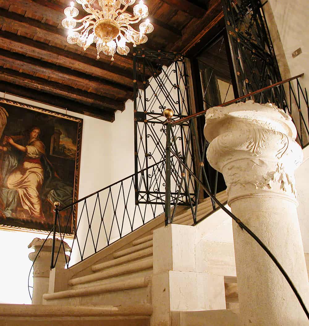 Grand stone staircase at Palazzo Abadessa in Venice