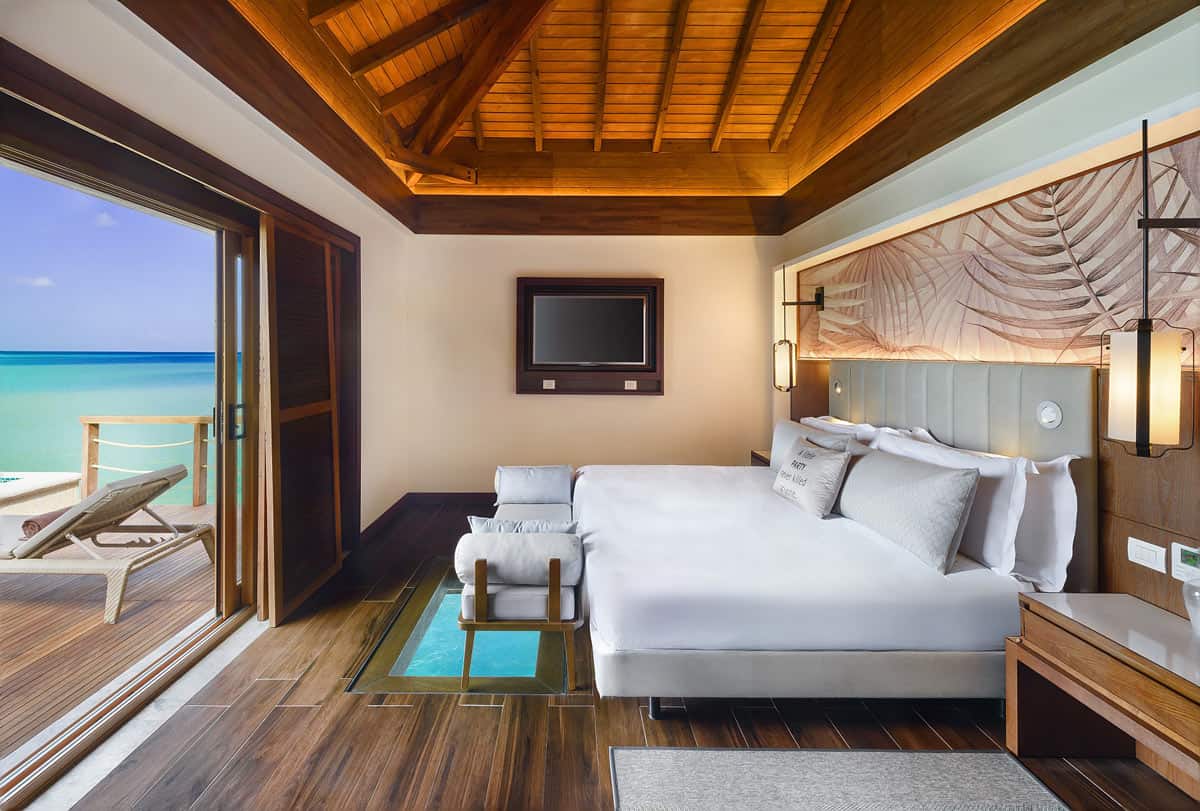 Royalton CHIC Antigua overwater bungalow bedroom