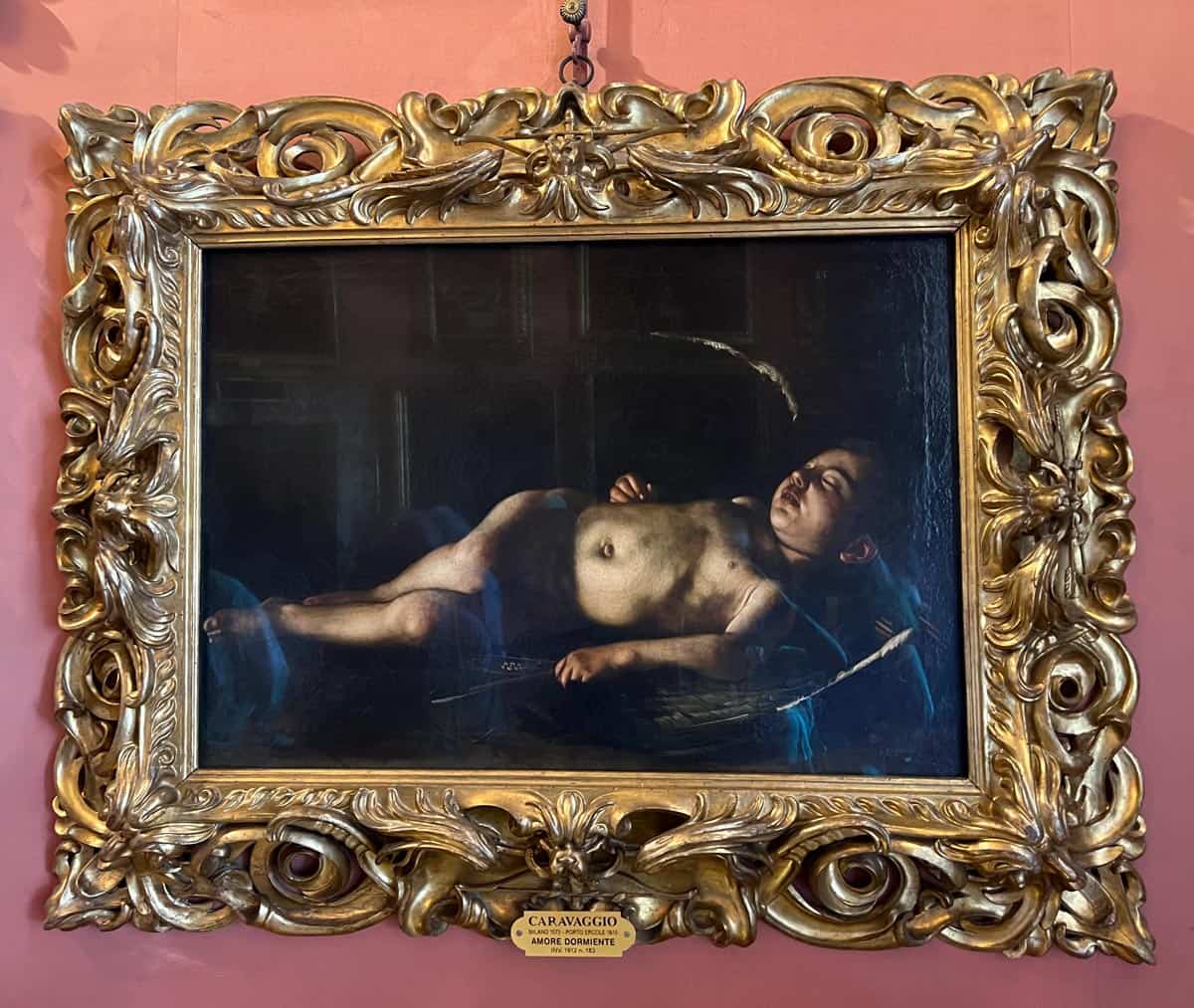 "Sleeping Cupid" painting by Caravaggio in the Pitti Palace