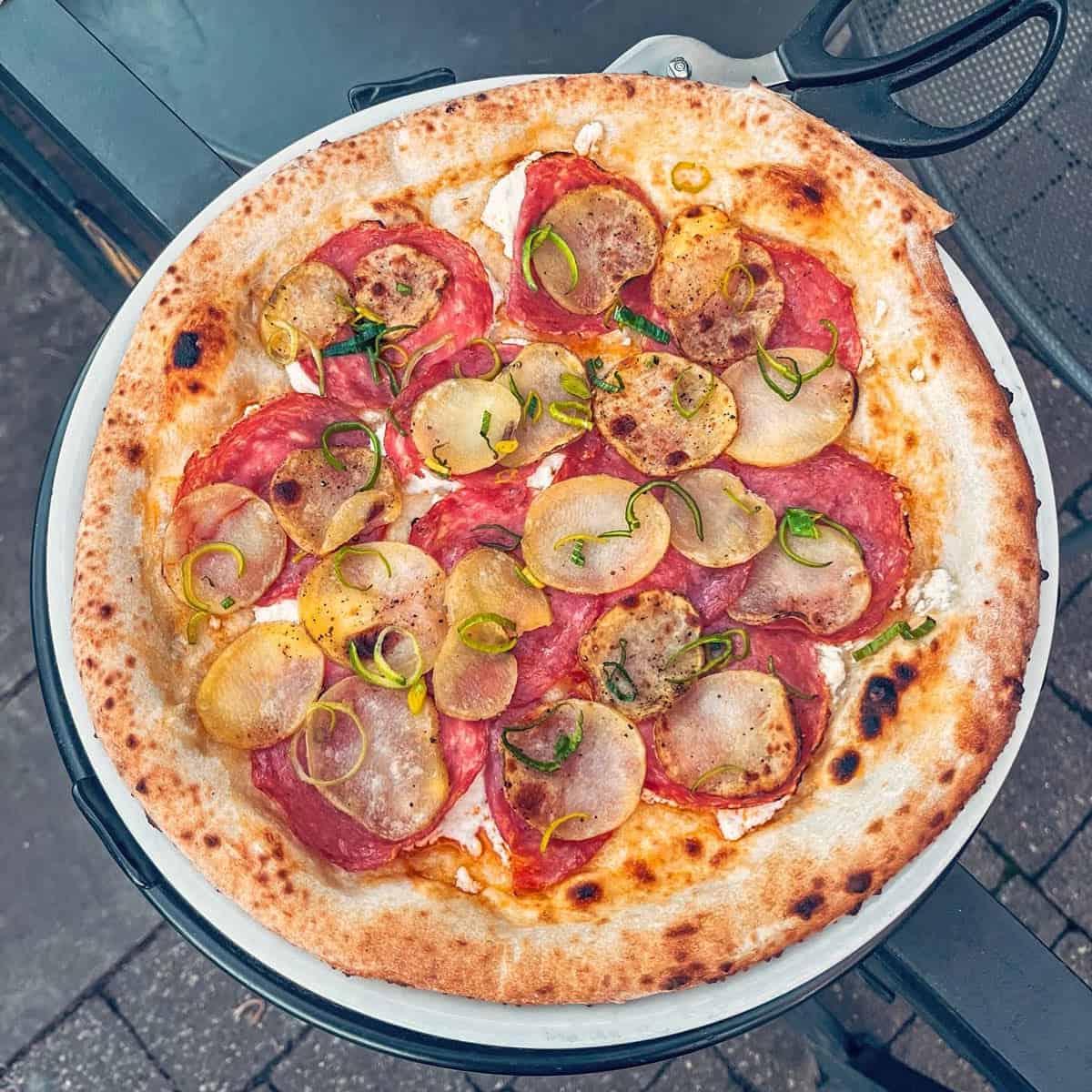 Potato and salami pizza