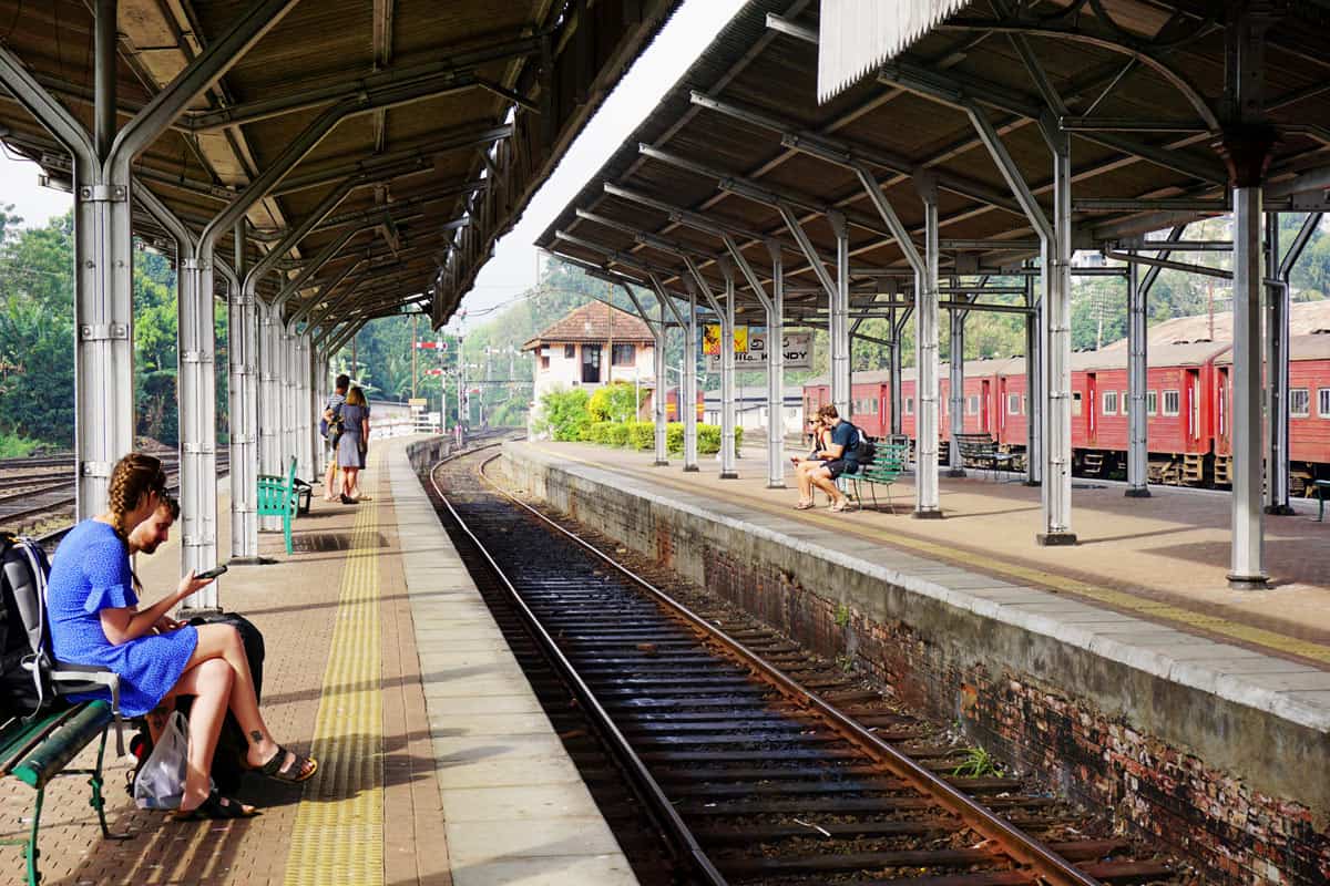 Passengers wait at the Kandy train station