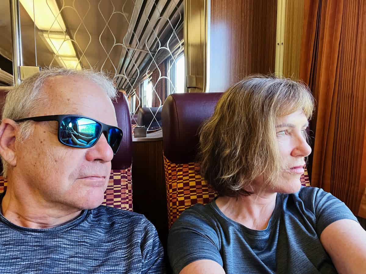 Couple traveling on the train in Portugal