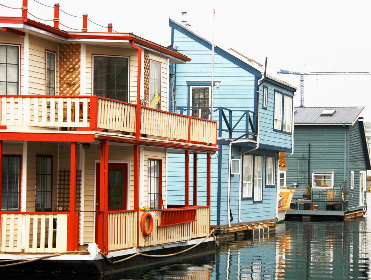 Several colorful houseboats are permanently moored at Victoria's Fisherman's Wharf.