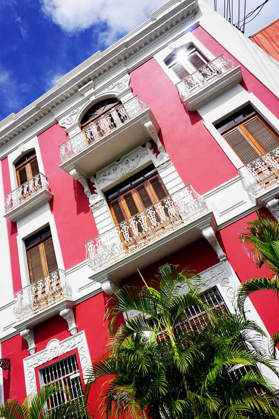 Red building with white window frames in Old San Juan