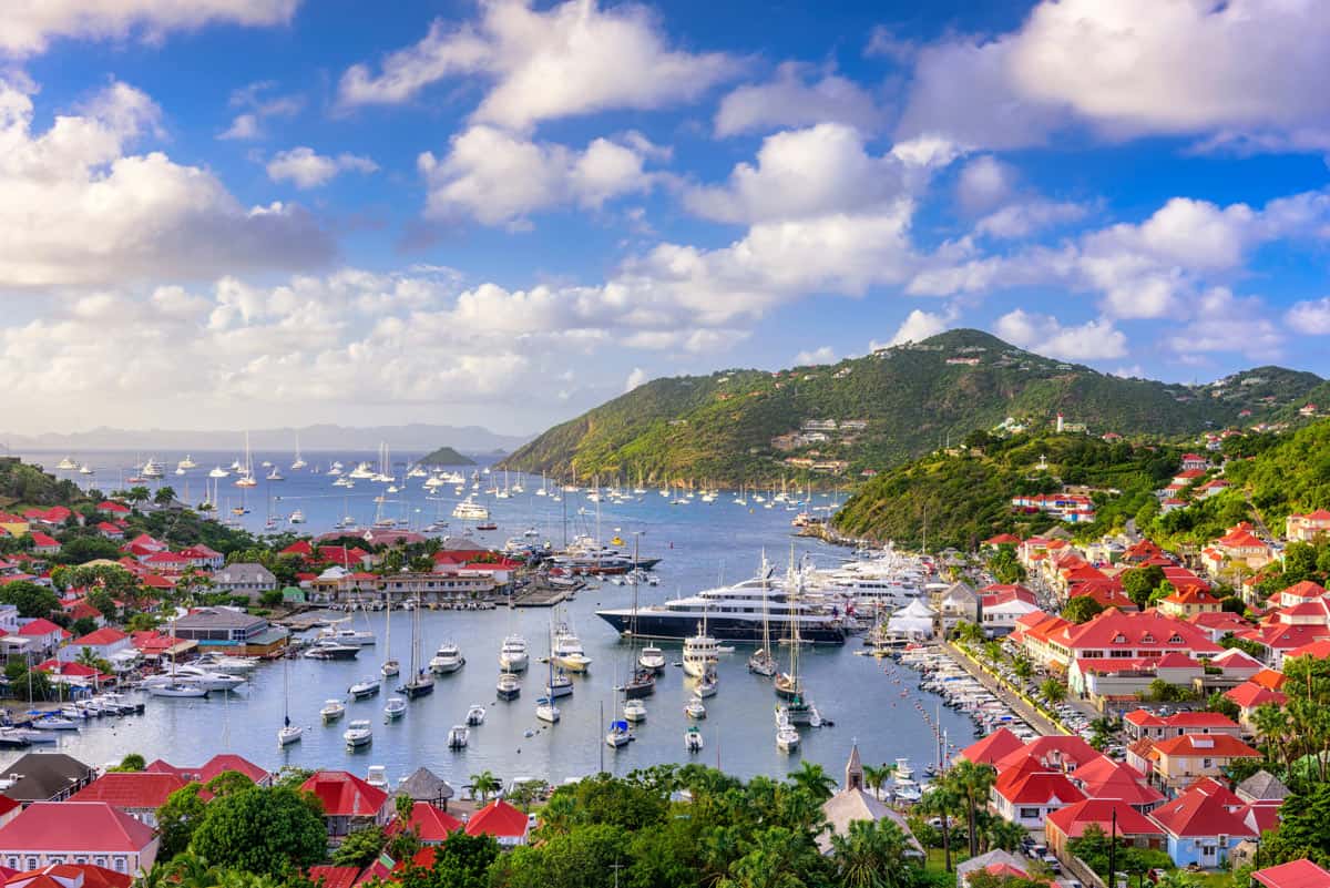 Gustavia’s harbor in St. Barts brims with luxury yachts and red-roofed shops