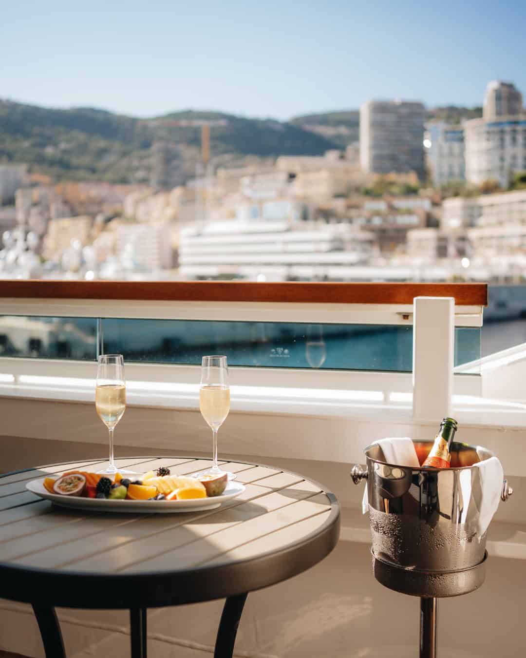 Two glasses of champagne on cruise ship balcony in Monaco