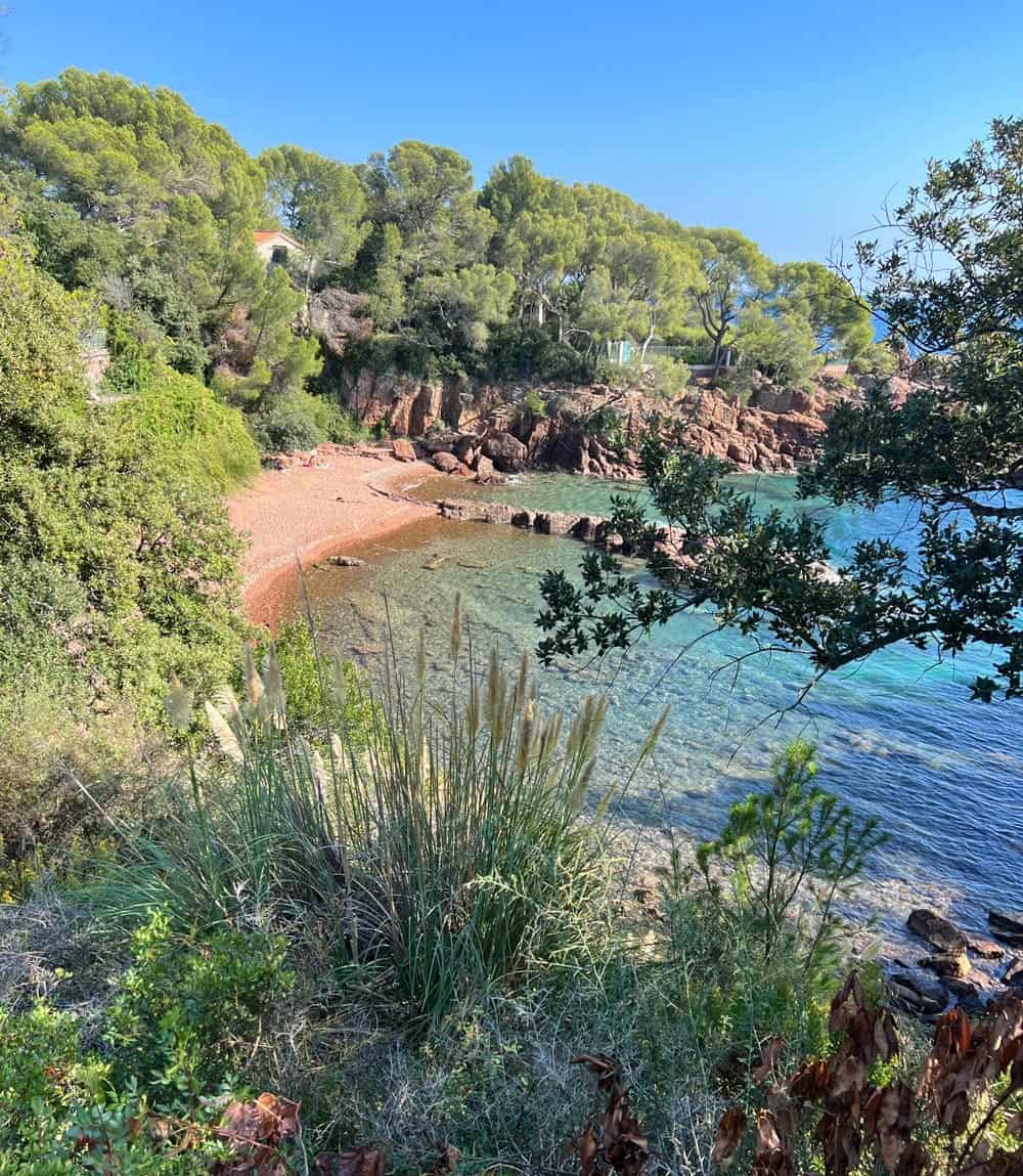 Sandy-pebble beach cove on the Esterel coastal walking path outside of Saint-Raphael