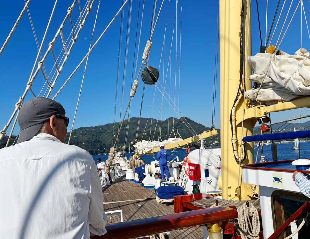 Passenger at the bow of the Star Flyer sailing ship