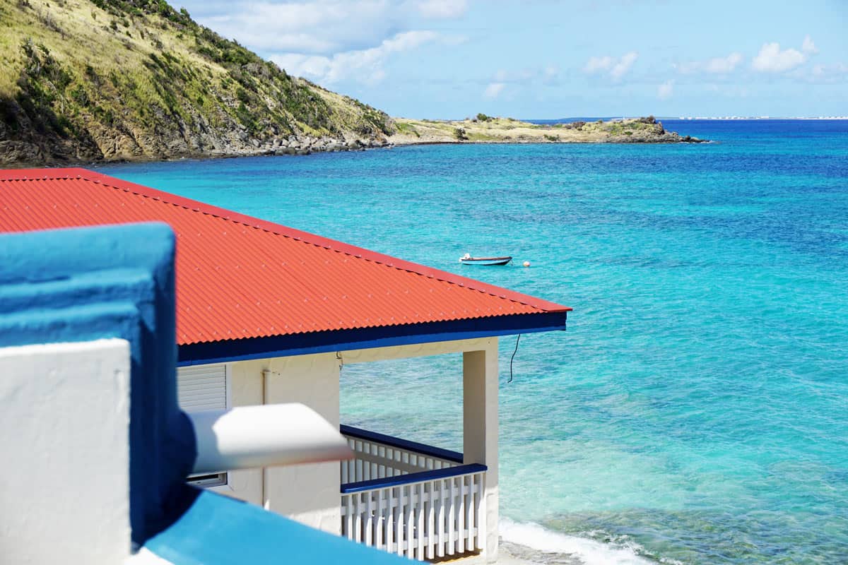 Turquoise ocean view from balcony of Le Petit Hotel