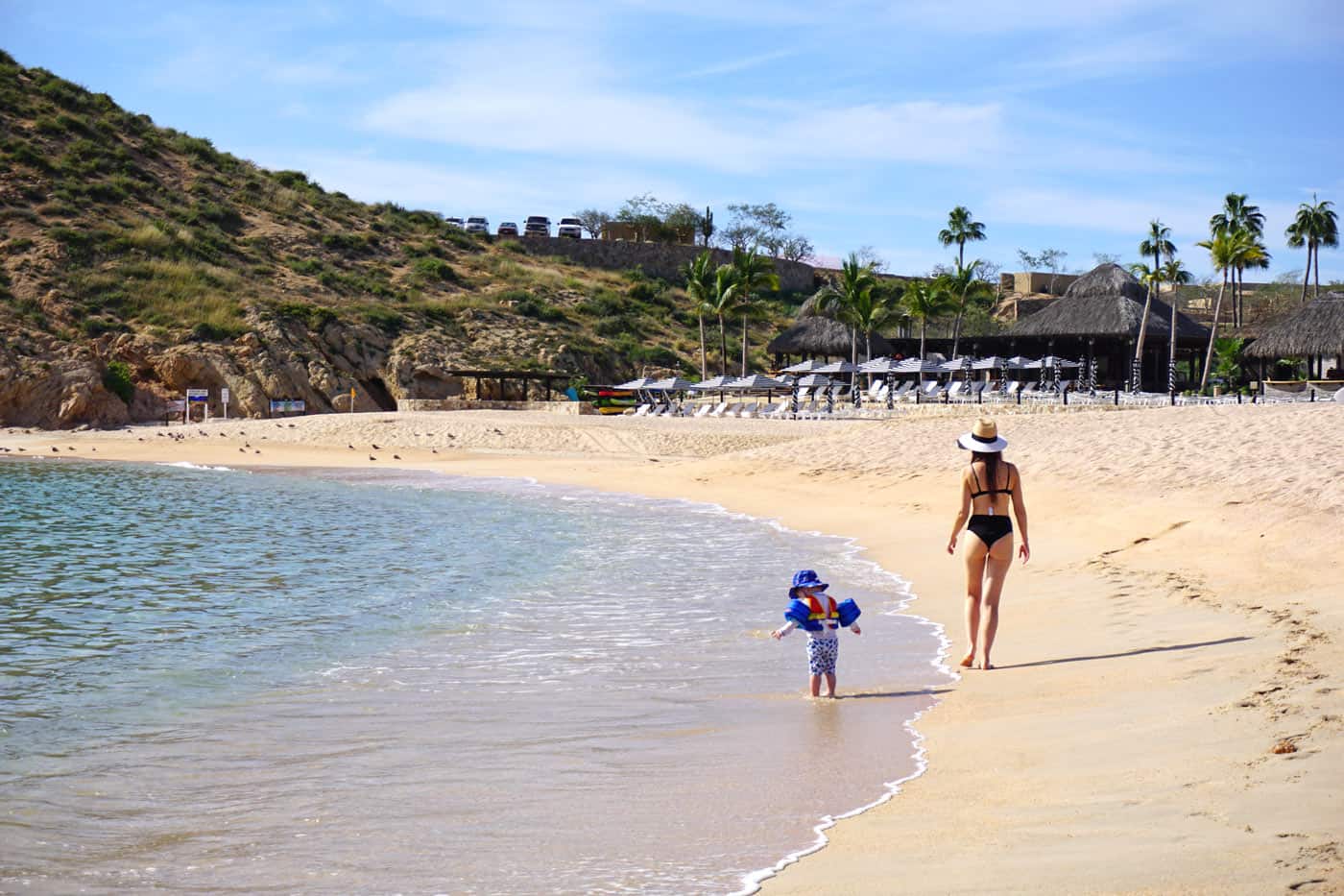 Mother and child on Santa Maria Beach in front of Montage Los Cabos