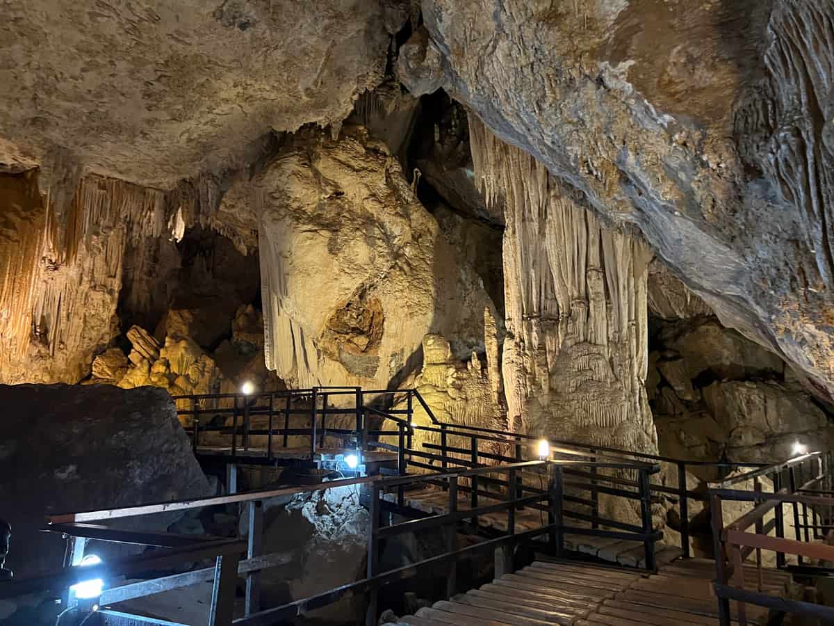 Stalactites, stalagmites and a raised boardwalk winding through Diamond Cave on Railay, Thailand