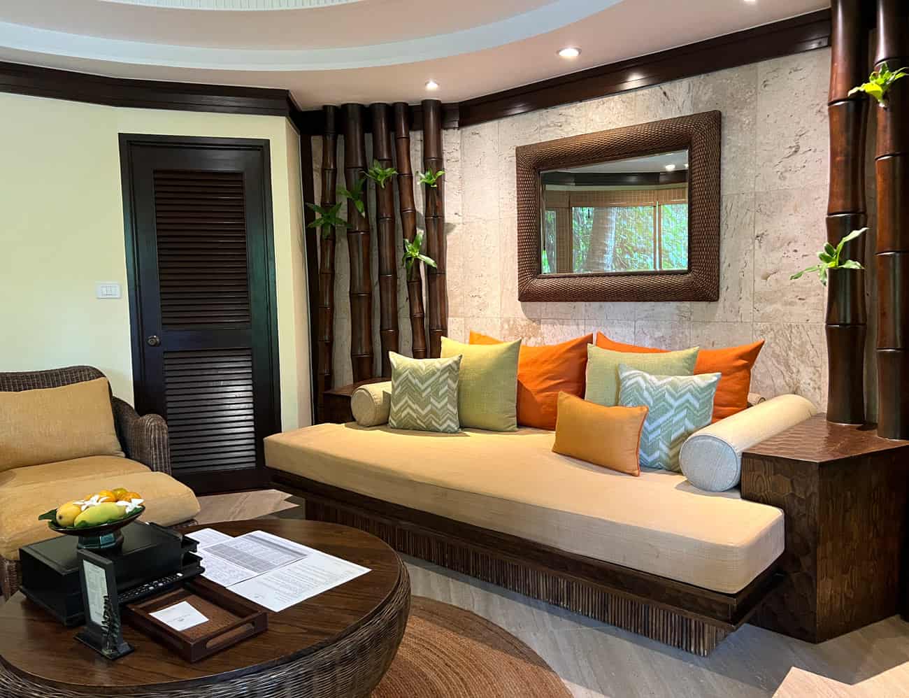 Rayavdee pavilion living room with day best and orange and green silk cushions