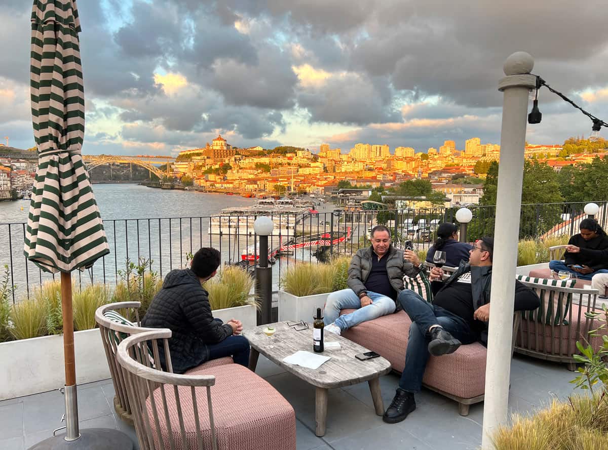 Sunset view from the rooftop bar at The Rebello Hotel & Spa in Porto