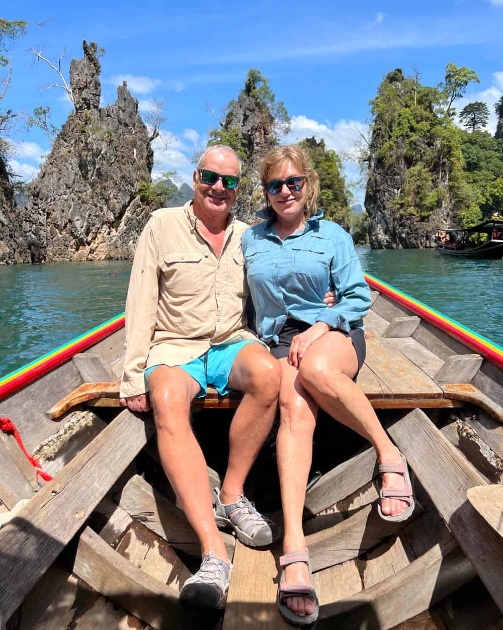 Couple on longtail boat in southern Thailand