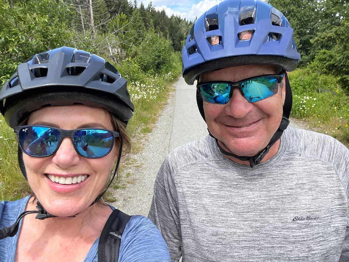 Couple bicycling along Whistler's bike paths
