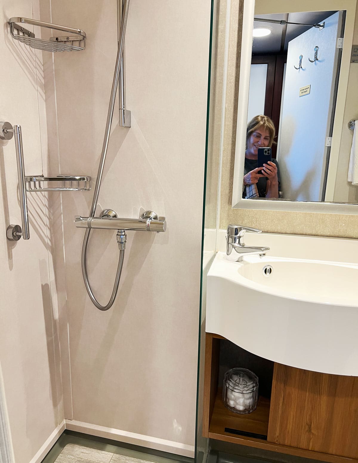 Shower and sink in Quest bathroom for Veranda Stateroom