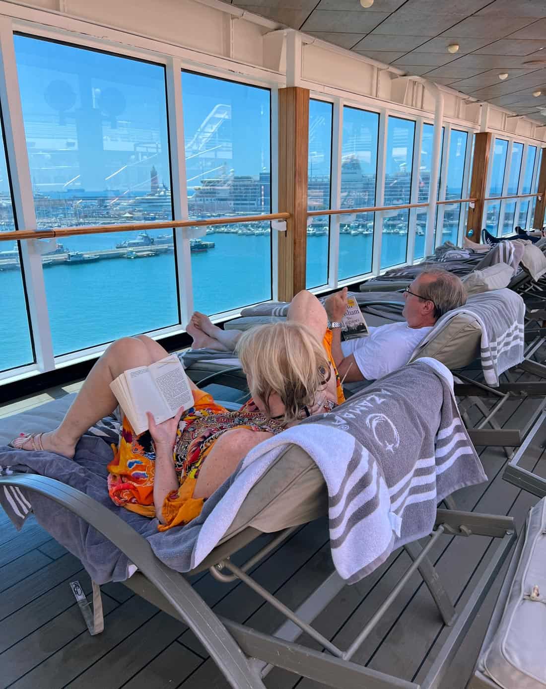 These poolside loungers on Azamara Quest combine ocean views and protection from the elements.