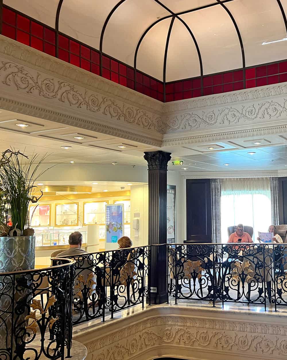 Passengers reading in an Azamara Quest lounge