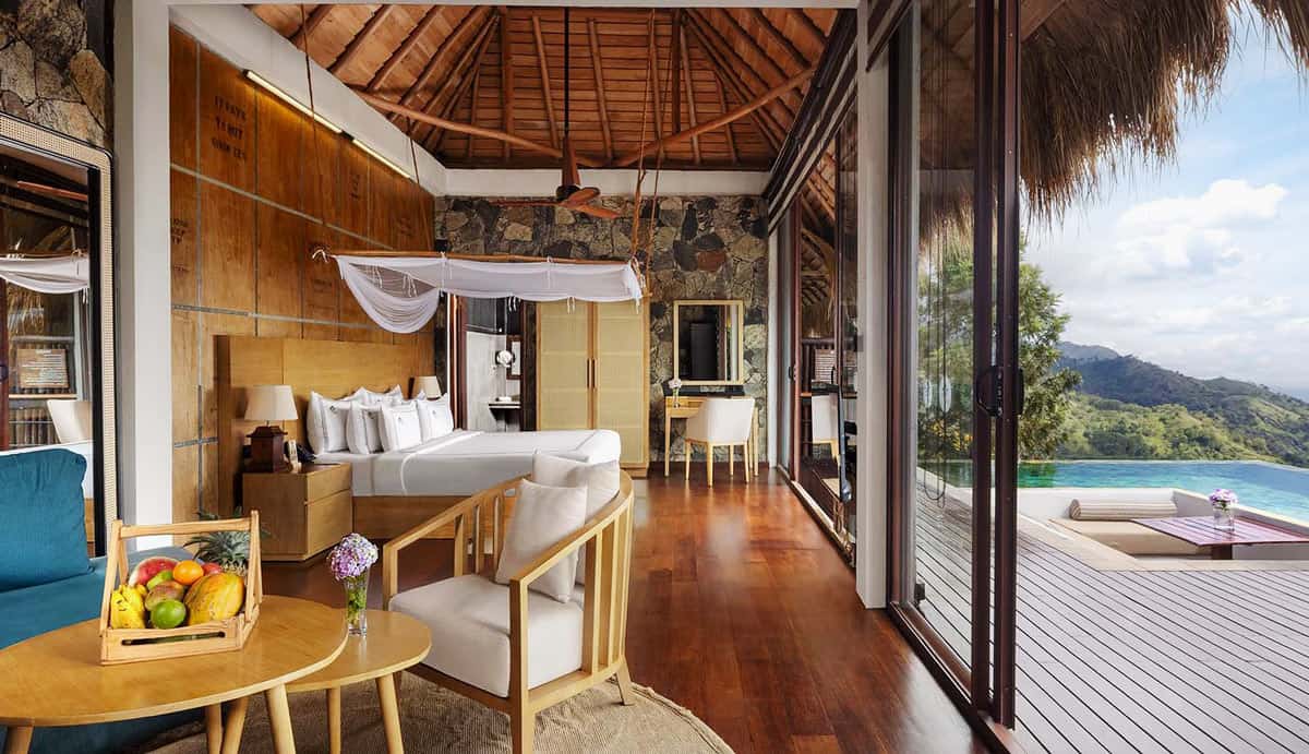 A Grand Executive Suite at 98 Acres Resort & Spa, with polished wood floors, a private plunge pool and mountain views